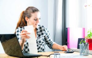 Young woman lodging her tax before the tax deadline