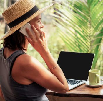 Girl using her phone to call a client