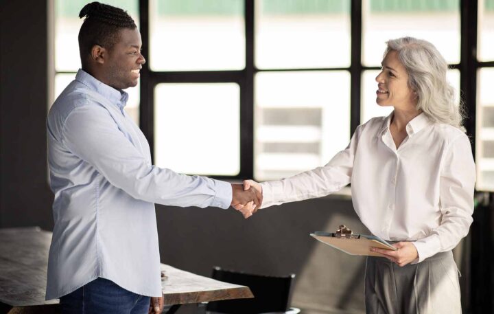 Employer and Employee Shaking Hands